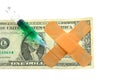 US dollar bill with bandaids Royalty Free Stock Photo