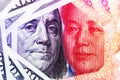 US dollar and China Yuan banknote .It is symbol of economic tariffs trade war and tax barrier between United States of America and Royalty Free Stock Photo