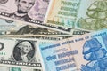 US Dollar and Zimbabwe hyperinflation Dollar banknotes.
