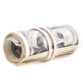 100 US dollars banknotes rolled up and tightened with rubber ban Royalty Free Stock Photo