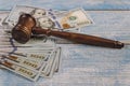 US dollars and on law hammer of the judge corruption, money financial crime Royalty Free Stock Photo