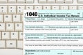 US federal 1040 tax return form on a keyboard