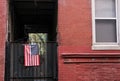 US flag seen attached to a side gate at a US home.