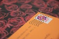 US Love themed stamp close up on orange envelope Royalty Free Stock Photo