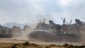 US Marine Corps Landing Craft Air Cushion or LCAC lands on the beach Royalty Free Stock Photo