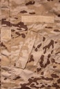 US marine desert marpat digital camouflage fabric texture back. Close-up of a fragment of a military uniform