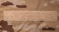 US marine desert marpat digital camouflage fabric texture back. Close-up of a fragment of a military uniform Royalty Free Stock Photo