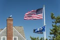 US Flag waving over blue sky