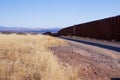 The US-Mexico border wall in Arizona desert Royalty Free Stock Photo