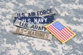 US MILITARY concept with branch tapes on camouflage uniform Royalty Free Stock Photo