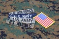 US MILITARY concept with branch tapes on camouflage uniform Royalty Free Stock Photo