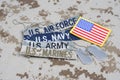 US MILITARY concept with branch tapes and dog tags on camouflage uniform Royalty Free Stock Photo