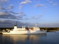 US Naval Ship In Sunset Light