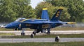 US Navy Blue Angel Jet landing at an airport Royalty Free Stock Photo