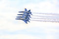 US Navy Blue Angels Hornet Fighter Jets Flying In A Tight Formation With Smoke Trails Royalty Free Stock Photo