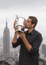 US Open 2014 champion Marin Cilic posing with US Open trophy on the Top of the Rock Observation Deck at Rockefeller Center