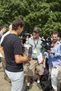 US Open 2013 champion Rafael Nadal with US Open trophy surrounded by journalists during interview in Central Park