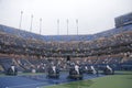 US Open cleaning crew drying tennis court after rain delay at Arthur Ashe Stadium Royalty Free Stock Photo