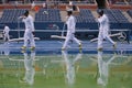 US Open cleaning crew drying tennis court after rain delay at Arthur Ashe Stadium Royalty Free Stock Photo