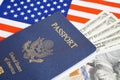 US passport with dollar money on USA flag, American citizen in United States of America Royalty Free Stock Photo