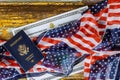 US passport and flag over a citizenship and naturalization certificate Royalty Free Stock Photo