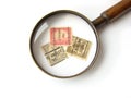 US postage stamps and magnifying glass