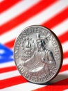 US quarter dollar coin with drummer close up and USA flag. Stars and stripes in the blur. Beautiful vertical illustration of Royalty Free Stock Photo