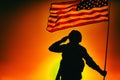 US soldier saluting and honoring fallen heroes Royalty Free Stock Photo