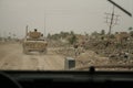 US Soldier watches Iraqi Children