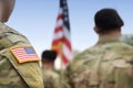 US soldiers. US army. USA patch flag on the US military uniform. Soldiers on the parade ground from the back. Veterans Day. Royalty Free Stock Photo