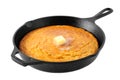 Freshly baked corn bread in a cast iron skillet