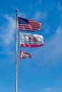 THe US Stars and Stripes, old glory and the California Republic flags waving