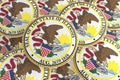 US State Buttons: Pile of Illinois Seal Badges 3d illustration Royalty Free Stock Photo
