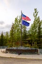USA and Alaska flags on a pole Royalty Free Stock Photo