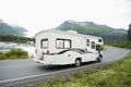 USA, Alaska, Recreational Vehicle Driving On Road Royalty Free Stock Photo