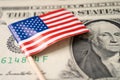 USA Amera flag on US dollar banknotes, import export finance business concept