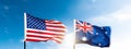 USA and Australia flags against blue sky Royalty Free Stock Photo