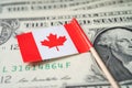 USA Canada flag on US dollar banknotes, import export finance business concept Royalty Free Stock Photo