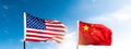 USA and China flags against blue sky Royalty Free Stock Photo