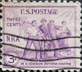 USA - Circa 1933: a postage stamp printed in the US showing four people: farmer, businessman, blacksmith, woman. National Recovery