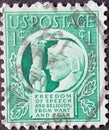 USA - Circa 1943: a postage stamp printed in the US showing the Liberty Holding the Lighted Torch of Freedom and Enlightenment Tex