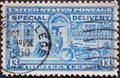 USA - Circa 1944: a postage stamp printed in the US showing a mail deliverer with a customer and a motorbike. Text: special delive
