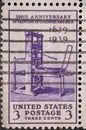 USA - Circa 1939: a postage stamp printed in the US showing a picture of the Stephen Daye Press - the first printing press used in