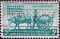 USA - Circa 1949: a postage stamp printed in the US showing a settler with an ox-cart to commemorate the centennial of the foundin