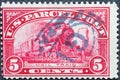 USA - Circa 1912 : a postage stamp printed in the US showing a steam locomotive with wagons Text: Mail train US Parcel Post