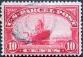 USA - Circa 1912 : a postage stamp printed in the US showing a steamship and mail tender text: US Parcel Post