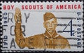 USA - Circa 1960 : a postage stamp printed in the US showing the 14-year-old Thornton Percival in a Scout uniform, giving the thre Royalty Free Stock Photo
