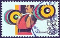 USA - CIRCA 1983: A stamp printed in USA from the `Summer Olympic Games, Los Angeles 1984` issue shows a weightlifter athlete