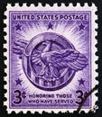 USA - CIRCA 1946: A stamp printed in USA from the `Veterans of World War II` issue shows Honorable Discharge Emblem, circa 1946.