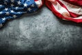 USA flag. American flag. American flag freely lying on concrete background. Close-up Studio shot. Toned Photo